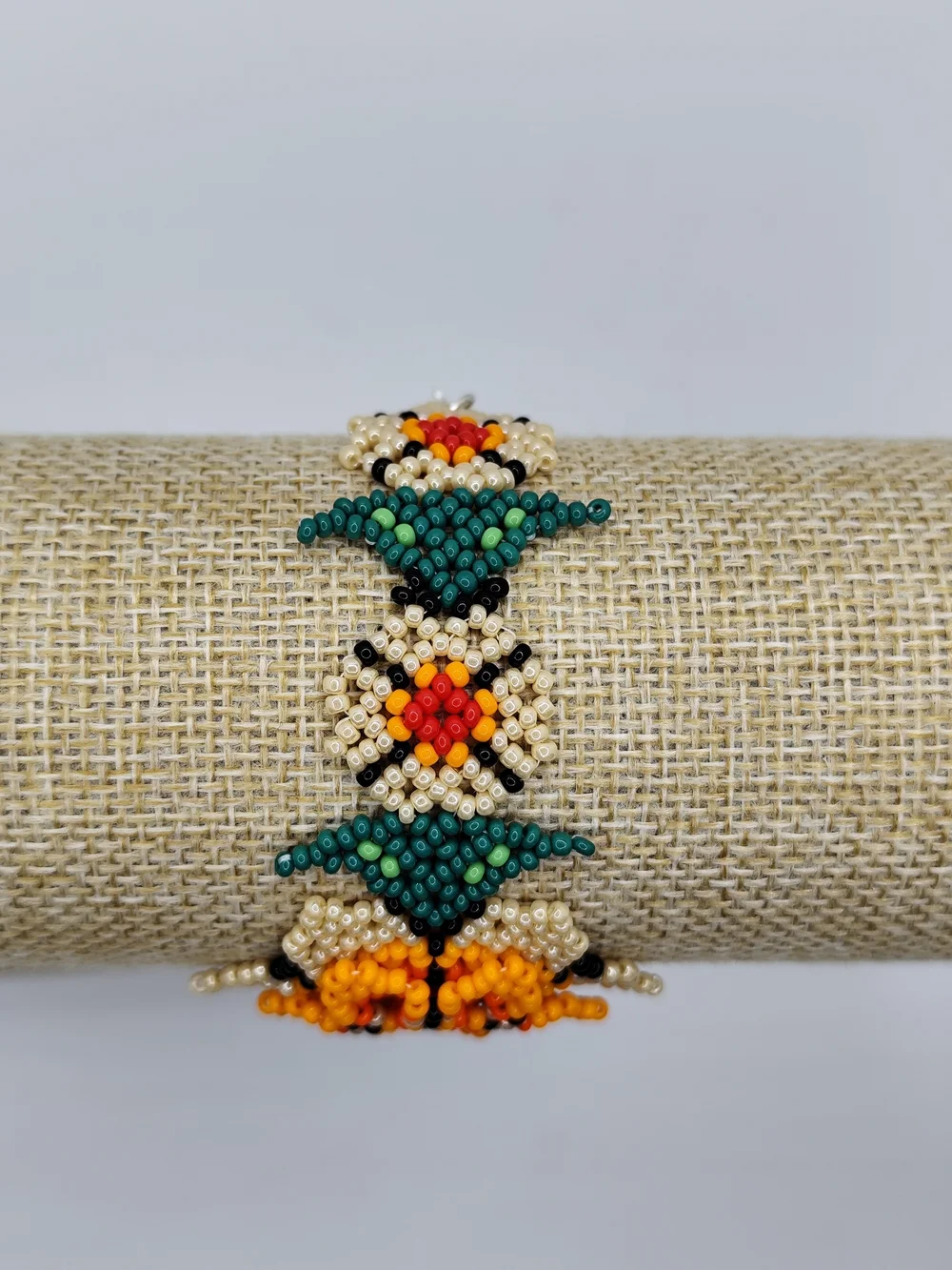 Vibrant Orange Floral Seed Bead Bracelet with Gold & Green Accents